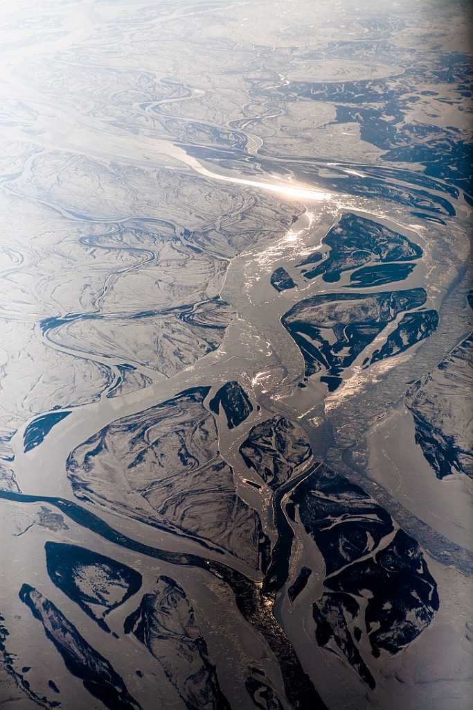 Flusslandschaft-Luftbild-Sonne-Glanz.jpg
